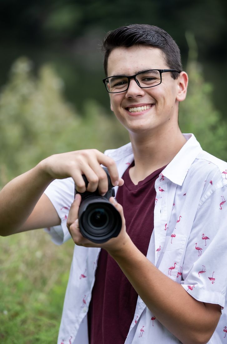 Mark Spead holding his camera